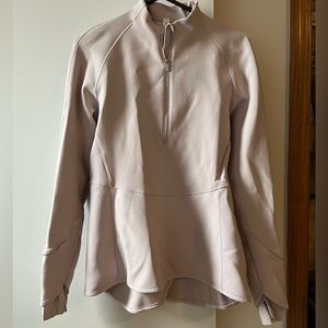 Light pink peplum work out shirt